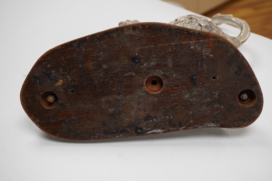 After Tim Nicklin(Kenyan) - A 1980's limited edition silver model of a running ostrich, by Roger John Squires, London, 1986, inscribed 'Tim Nicklin 2/10 1985', on a naturalistic base, fixed to a shaped oval wooden base,